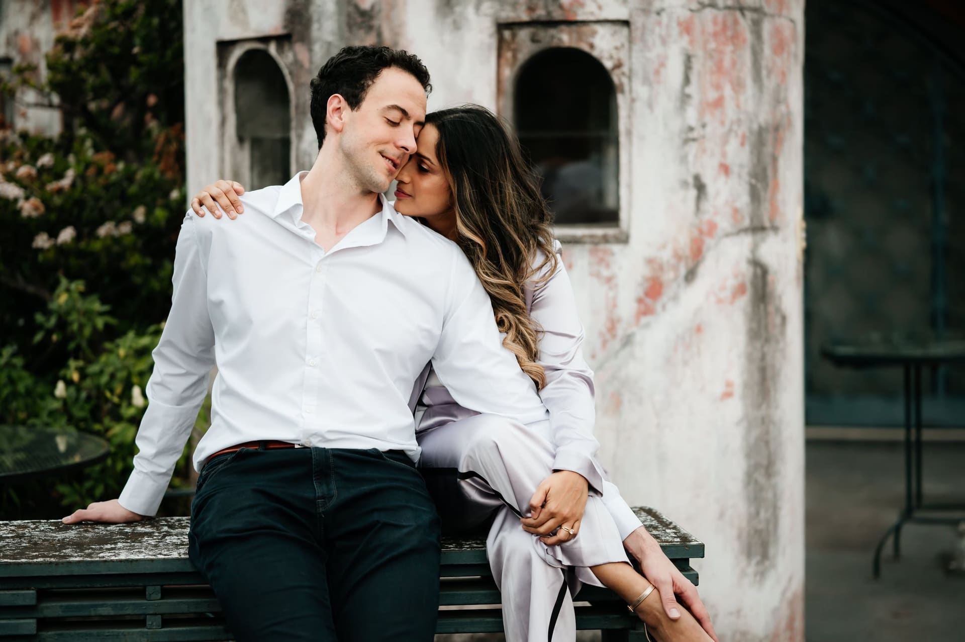 Couple embracing during a portrait session in Antigua Guatemala