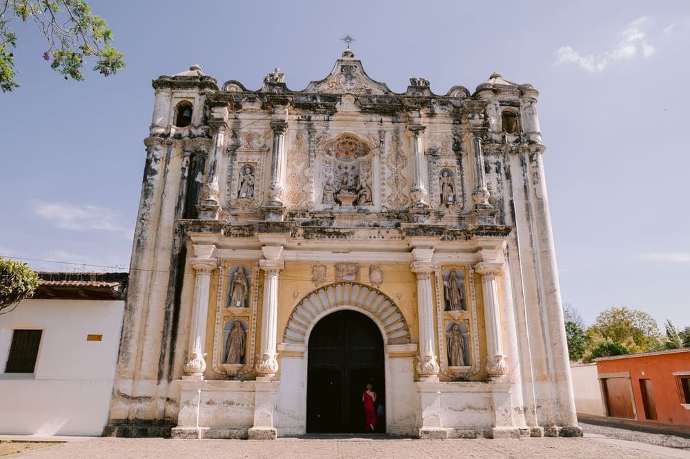 Baroque colonial church facade in Antigua Guatemala — ceremony venue for the destination wedding.
